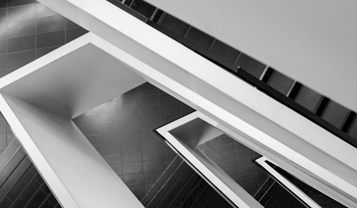 black and white staircase looking down